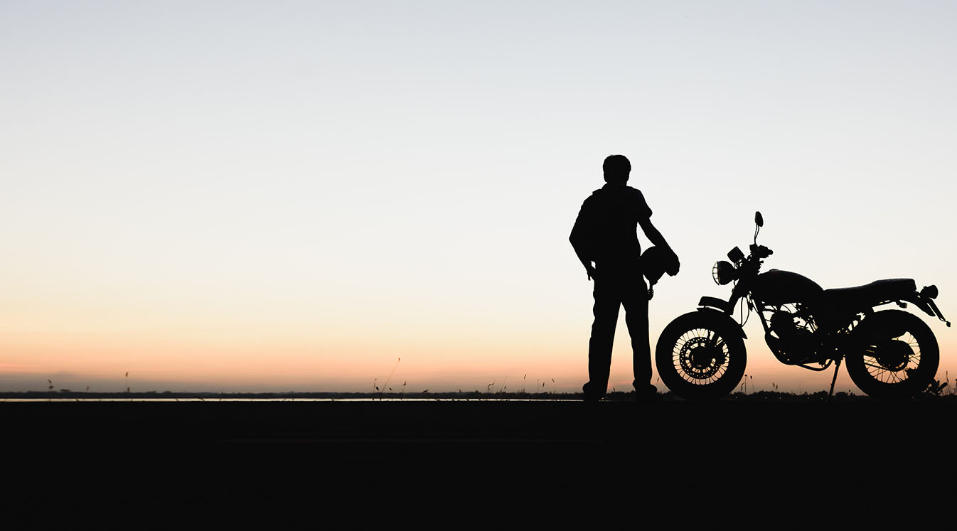 Biker man and motorcycle