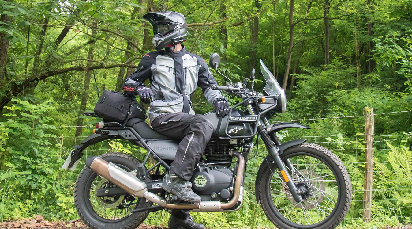 Man looking behind him on Motorcycle