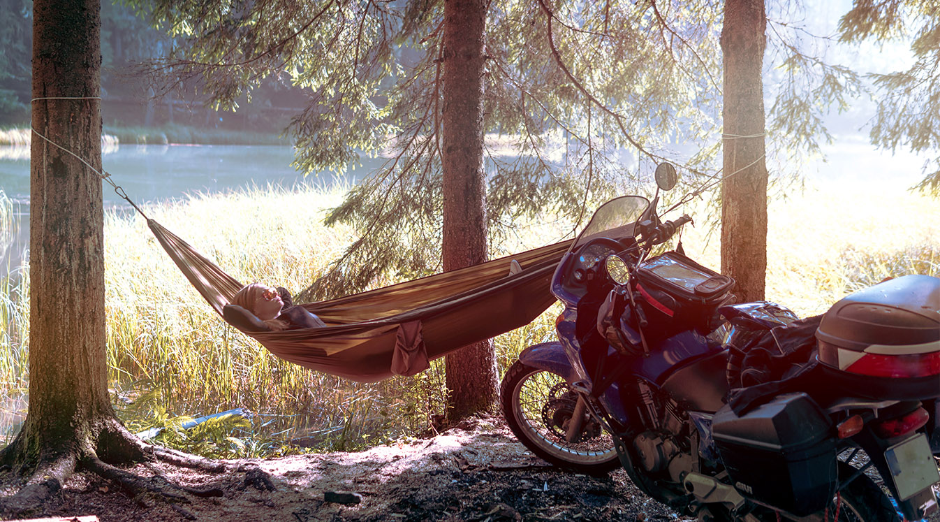 Camping in forest on side mountain lake