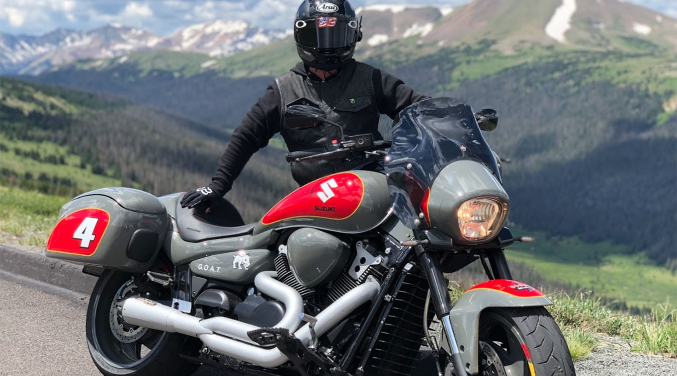 biker parked on mountainside