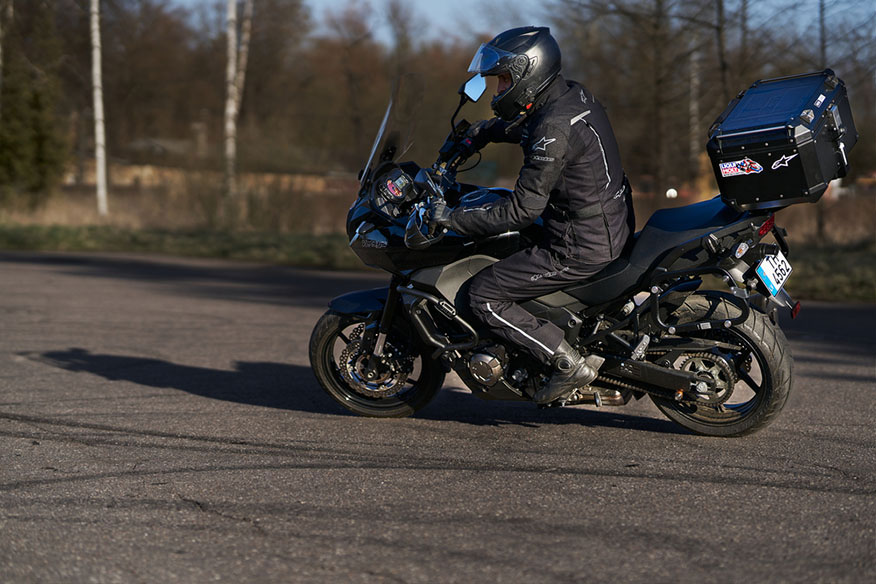 How to Mount a Backpack on a Motorcycle